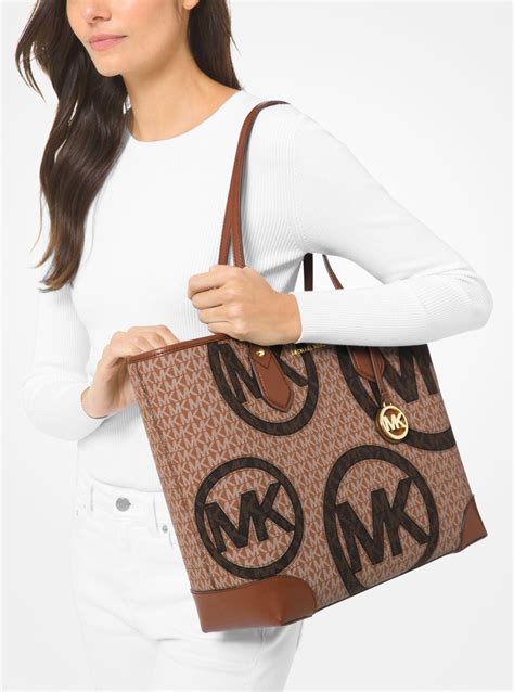 michael michael kors eva tote brown gold|Eva Large Logo Tote Bag .